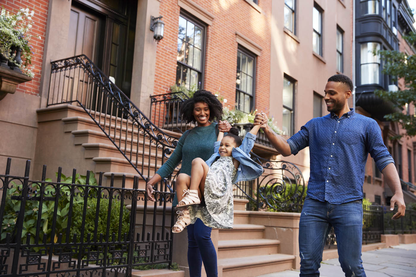 An image of a family walking down a city street - Rest Easy Pest Control offers expert pest control services in Nassau County, NY to protect your home or business.